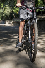 Fototapeta na wymiar athlete a cyclist closeup in training
