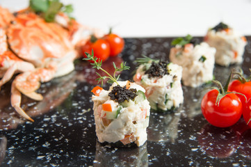 Crab Meat Salad with Black Caviar Horizontal tomato and crabs