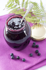 Bilberry confiture in a glass jar