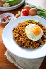 Indonesia Nasi Goreng fried rice with egg on white plate