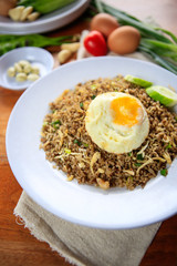 Indonesia Nasi Goreng fried rice with egg on white plate