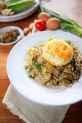 Indonesia Nasi Goreng fried rice with egg on white plate