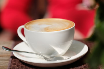 Cup of cappuccino in outdoor cafe