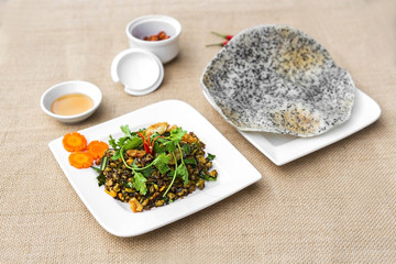 Vietnamese fried clams with rice pancake and chili sauce