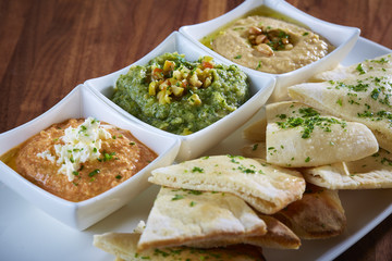 Mashed pork and beef with fried bread on white plate