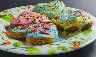 Valentine cookies in the shape of heart on black background