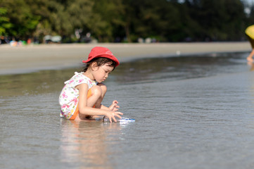 Young little girl on the beach