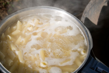 Cooking pasta at the campsite