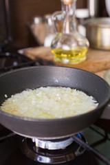 Fried onions in a frying pan