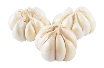 Three Garlic Bulbs and Garlic Cloves on White Background