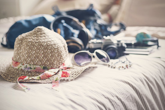 Full of things prepare to travel on holiday in bedroom