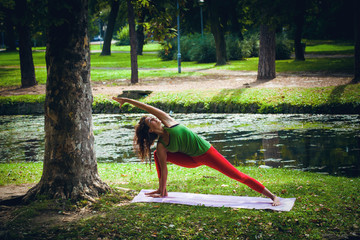 young woman practice yoga outdoor
