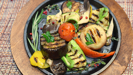 Fototapeta na wymiar Seasonal grilled vegetables with eggplant, mushroom, cucumber an