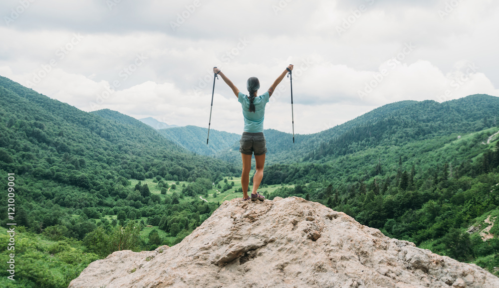 Canvas Prints Happy hiker with trekking poles