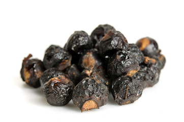 Soap nut tree or soapberry Sapindus Reetha isolated on white bac