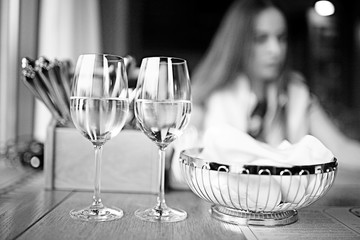restaurant serving wine woman