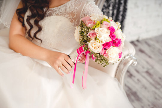 Bridal Bouquet In Brides Hands