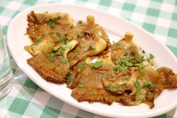 Grilled mushrooms with greens