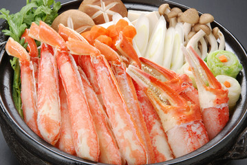 Raw fresh cold snow crab pot set with claws, legs, mushroom and