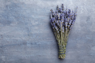 Fototapeta premium Bunch of lavender flowers on grey background