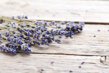 Bunch of lavender flowers on grey wooden background