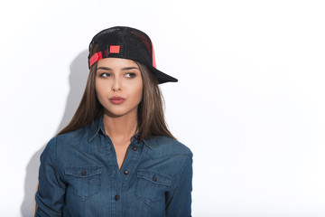 Cheerful hipster girl expressing her mistrust