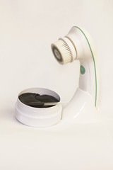 Electric brush cleanser for face and eye patches