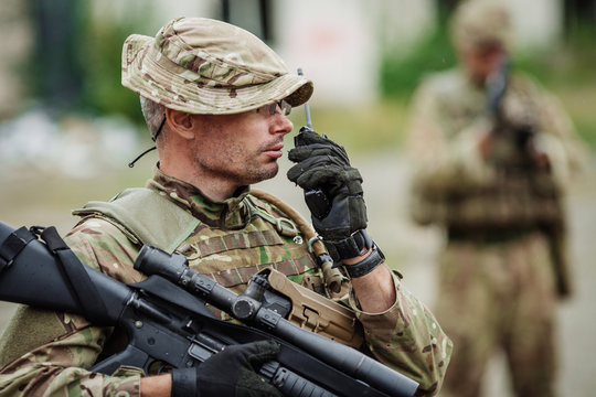 Soldier Holds A Radio Station, And Give Orders Subdivision..