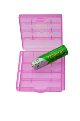 Two plastic battery holder and one battery on white