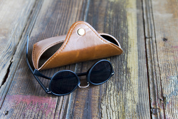 glasses with a leather carrying case