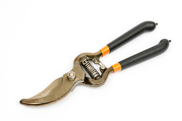 Garden pruner over white background