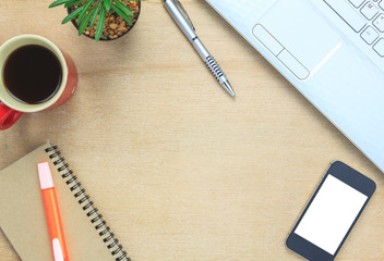 Top view notebook,pen,black coffee,tree,note paper,smartphone.