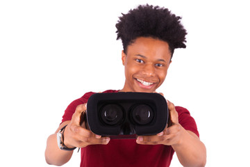 African American young man giving a vr virtual reality headset o