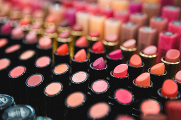 The multi-colored lipstick. Women's cosmetics. Sets.