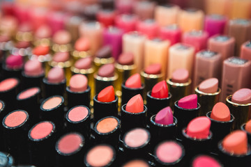The multi-colored lipstick. Women's cosmetics. Sets.
