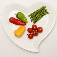 Heart shaped plate and vegetables