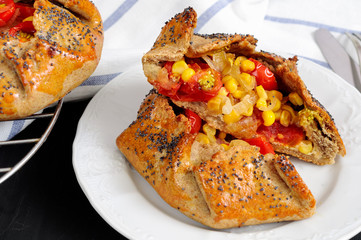 Spicy rye galettes with tomatoes, corn and ricotta