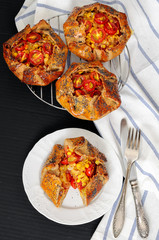 Spicy rye galettes with tomatoes, corn and ricotta