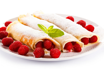 Crepes with raspberries and cream 