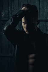 Man in shirt with muscular torso