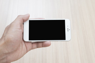 Hand holding a cellphone