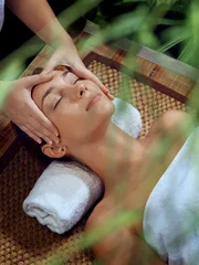 Fotobehang portrait of young beautiful woman in spa environment © Dmitry Ersler