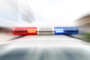 Red and blue emergency flashing siren.