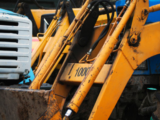 fragment of the working equipment: tractor, bulldozer, excavator, truck, forklift