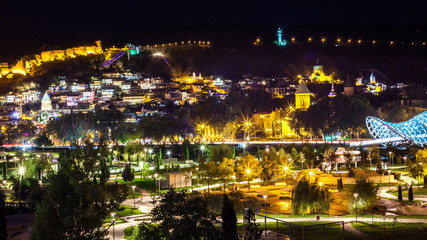 Fototapeta na wymiar Aerial night view of Old Tbilisi, Georgia with Illuminated churc