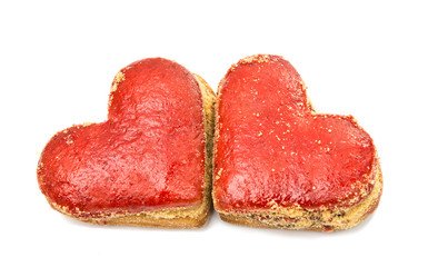 Cookies hearts in red icing isolated