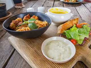 Spaghetti pasta with meatballs and tomato sauce
