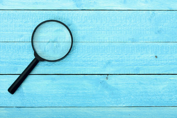 Magnifying glass on table