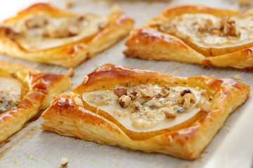 Pears baked in puff pastry with gorgonzola cheese and walnuts