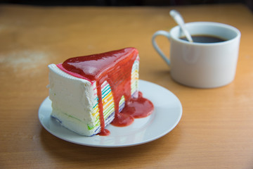 Rainbow crepe cake with strawberry juice